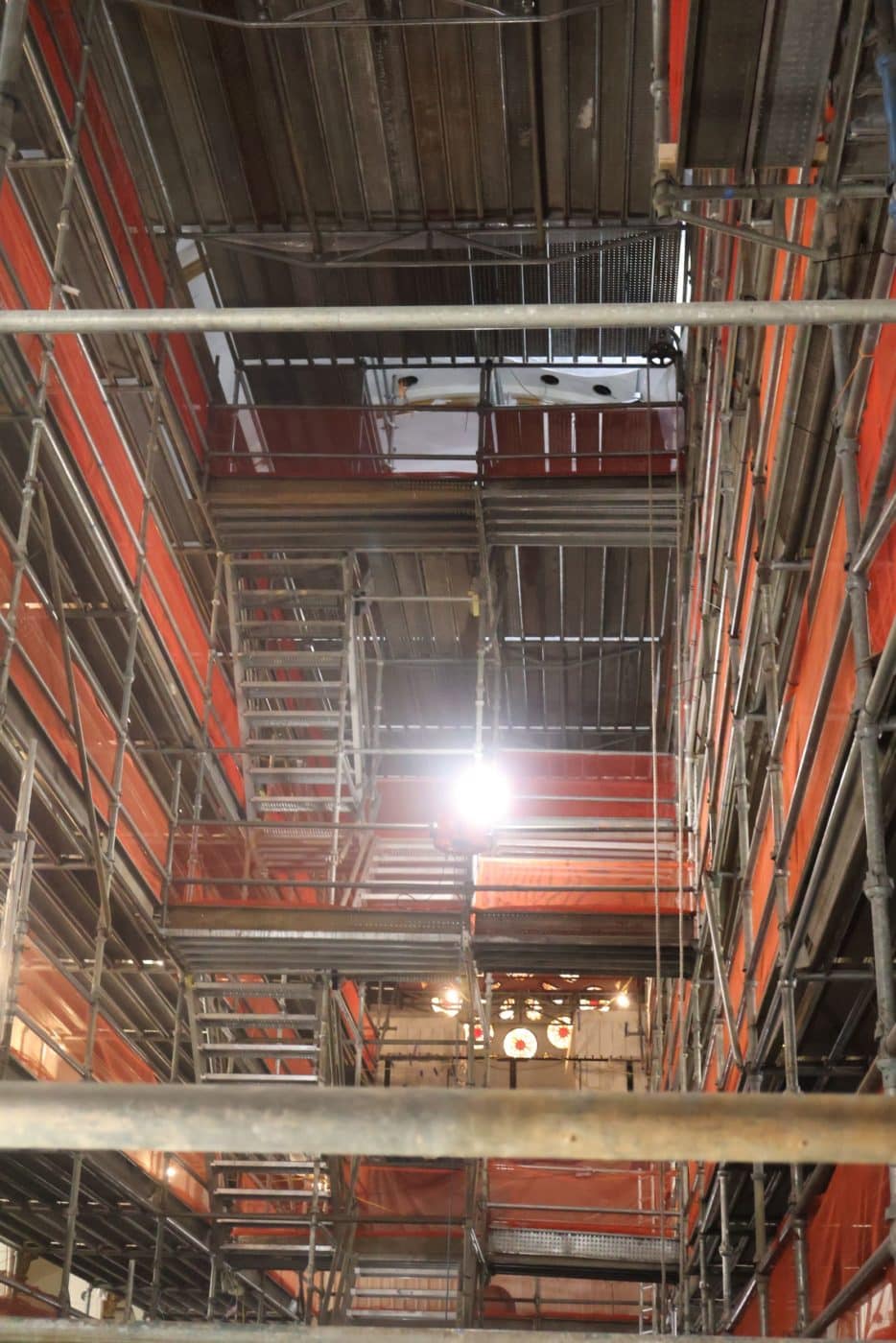 The interior of a building surrounded by scaffolding